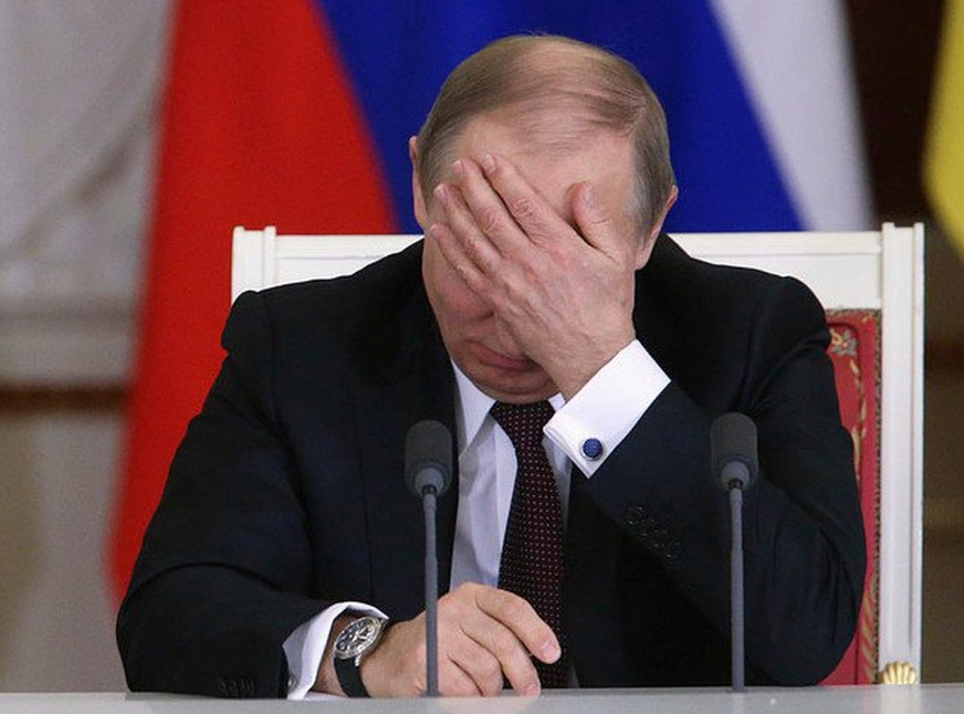 Путин за голову